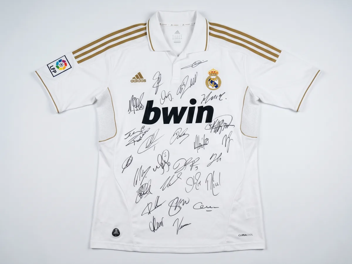 Signed 2011–12 Real Madrid Jersey — (26 Signatures)